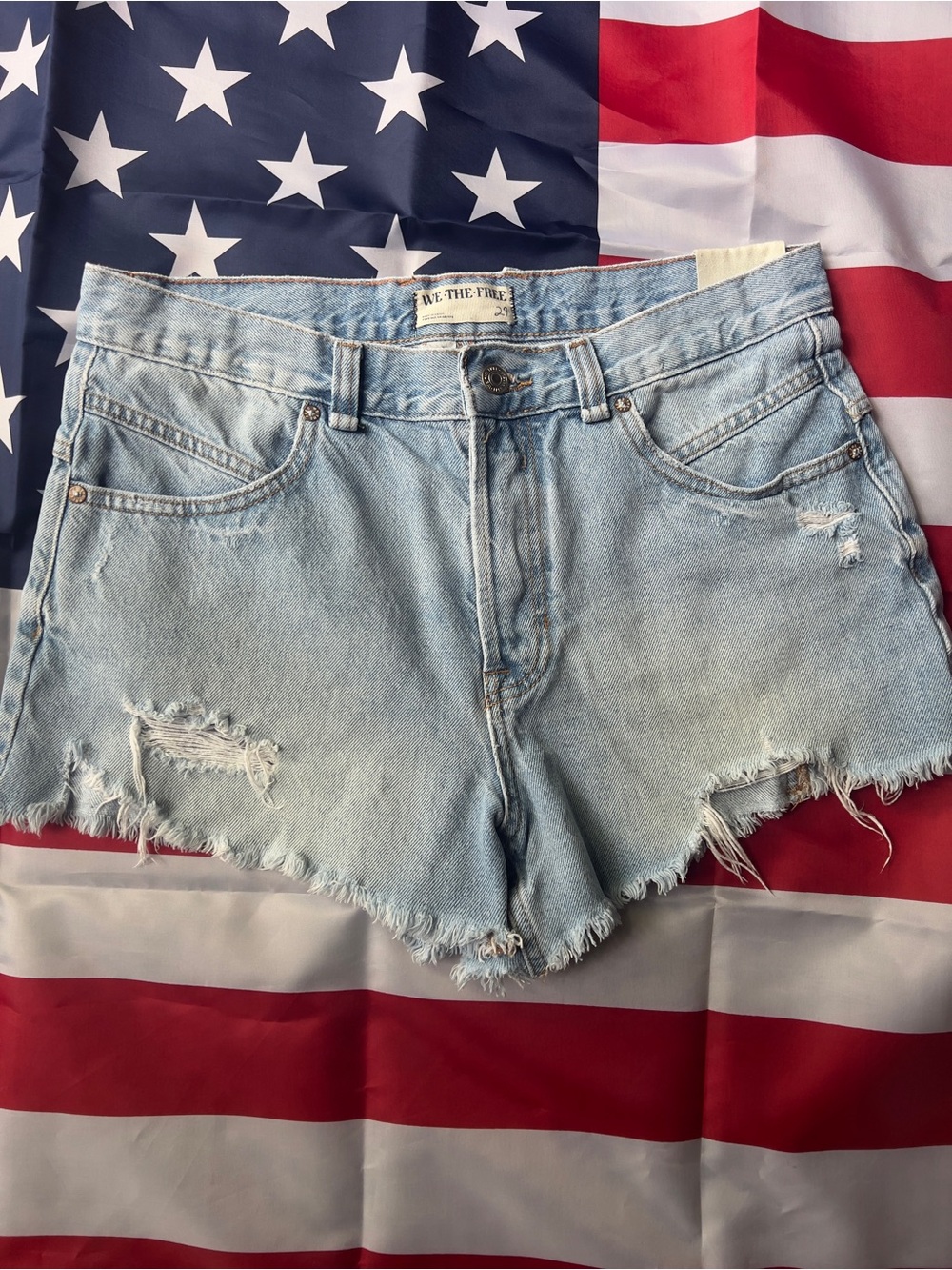 We The Free Light Wash Distressed Denim Cutoff Shorts